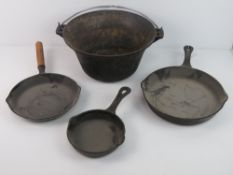 Cast iron jam pan and skillets.