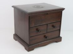 A wooden dressing table box for restoration.