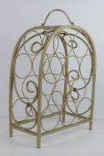 A white painted metal wine rack with handle over.