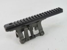 A Heckler and Koch quick detach long rail dual mounting STANAG / Picatinny mount.