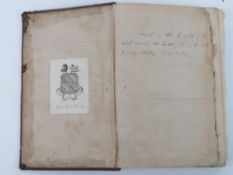 A rare leather bound book written in Urdu,