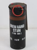 An inert stun hand grenade E180 MK2, with spoon and pin.