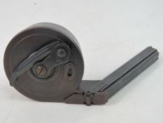 A Model Gun Company reproduction Snail drum Luger magazine, bears MGC mark upon.