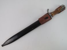 A German Butcher's Bayonet with scabbard and frog.