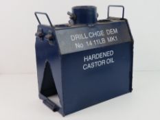 An inert Drill No.14 11LB Mk1 Demolition Charge.