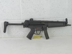 A deactivated H&K MP5. SN C62216.