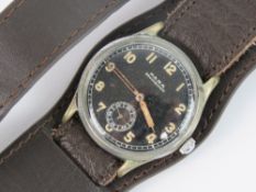 A WWII US Army watch made by PARA BRUCHSICHER with a repro strap and comes with a modern box.