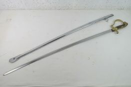 A reproduction WWI German Lion's Head Officer's sword with scabbard.