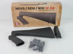 A Moss/ Rem/ Win 12 Gauge Shotforce pistol grip stock, with adapter kit, in original box.