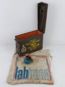 A 7.62 ammo tin, an inert L111 British practise grenade and a Polish cloth bag.