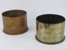 A WWI German Howitzer shell casing, dated 1917 and having mark upon. Approx. 11cm tall and 15.