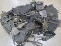 Fifty assorted magazine pouches and breach covers including;