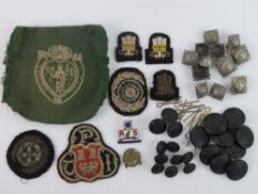 A quantity of St Johns Ambulance black plasticised buttons,