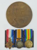 A WWI Medal set and Death Penny for Pte Frederick Cooper.