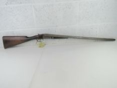 A deactivated English Charles Lancaster of London Double Barrel 12 Gauge Boxlock Shotgun,