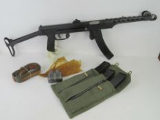 A deactivated PPS43 with accessories; three spare magazines, mag pouch, sling, cleaning rod,