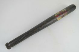 Antique wooden truncheon bearing English shield and the letters Y.