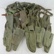 Twelve PM63 Holsters and twelve Lanyards.