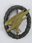 A WWII German Luftwaffe Paratrooper Badge By C.E.Junker Berlin SW with pin.