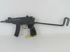 A deactivated Skorpion Wz61 7.65mm Sub Machine Gun with black polymer grip.