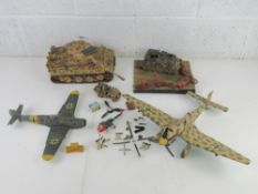 A quantity of assorted military themed models, a/f.