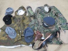 A quantity of assorted reproduction WWII