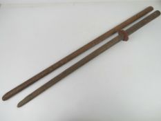 A wooden Bokken having Japanese characte