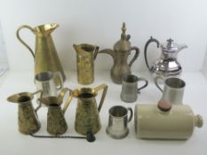 A quantity of metalware including brass, pewter and silver plate. Also a stoneware foot warmer.