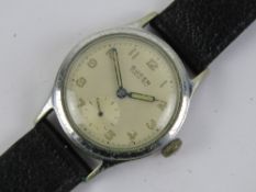 A vintage Buren wristwatch having receipt dated 1958, within original box.