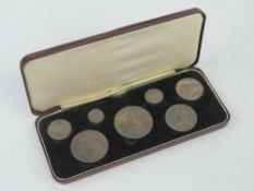 An 1887 Victoria Jubilee specimen silver coin set comprising crown, double florin, half florin,