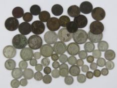 A collection of British coinage including William & Mary, George III, Victoria, etc.