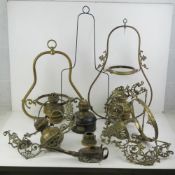 A quantity of lighting fixtures including brass fittings, crystal drops, etc.