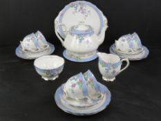 A Royal Albert tea service in Harebell pattern' including teapot, milk, sugar,
