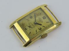 A 14ct gold Longines wristwatch, case bearing Continental 585 hallmark and weighing 11.