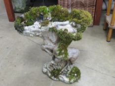 A birdbath having fawn design, 47cm high.