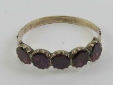 A Georgian garnet five stone ring,