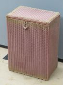 A LLoyd Loom Lusty wicker laundry hamper bearing original label.