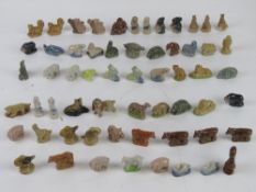 A quantity of Wade whimsies including Lady from Disney Lady and the Tramp.