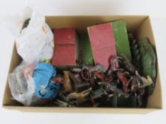 A collection of Britains animals, farm workers, machinery, etc. Mostly metal.