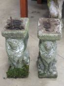 A pair of stone double sided lion bench supports, 38cm high.