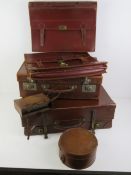 A leather suitcase, 44.