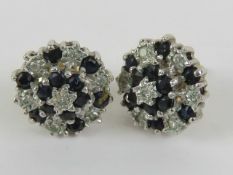 A pair of 9ct gold sapphire and diamond cluster earrings, hallmarked 375, with butterfly backs, 1.