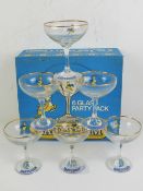 A set of six retro vintage Babycham glasses featuring the iconic Babycham deer with gilt rims over