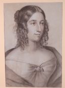 An early 19th century charcoal portrait, no obvious signature on front,