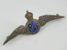 A sterling silver and enamel RAF 'Wings' sweetheart badge, 5.8cm wide.