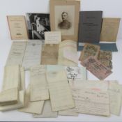 A quantity of assorted paper ephemera including autograph book, maps, photos, bank notes, etc.