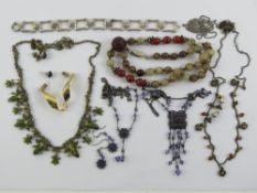 A small quantity of jewellery including carved Oriental hardstone bead necklace,