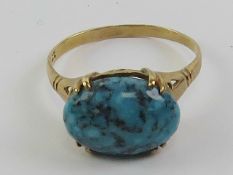 A 9ct gold an turquoise ring, stamped 9ct, size S, 2.68g.