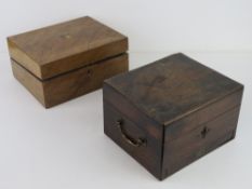 An antique writing box, lid lifting to reveal compartment within, having drawer under,