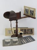 A stereoscopic viewer 'The Triumph Realisticscope' by The Fine Art Photo Publishing Co.